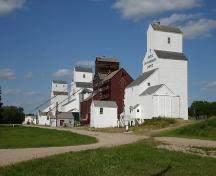 Contextual view, from the southwest, of the Inglis Grain Elevator Row, Inglis, 2005.; Historic Resources Branch, Manitoba Culture, Heritage and Tourism, 2005