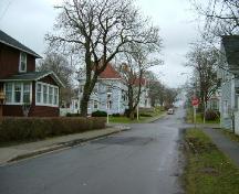 Looking east on north side of Alma Street, another entrance point to the District; Collins Heritage Conservation District, Yarmouth, 2005.; Heritage Division, NS Dept. of Tourism, Culture and Heritage,
2005.
