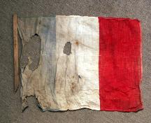 Salle de l'Assomption - les restes d'un drapeau acadien trouvé dans les murs de l'édifice; Centre for Acadian Studies
