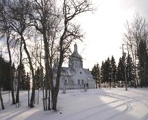 Contextual view, from the northeast, of St. Nicholas Ukrainian Catholic Church, Rackham area, 2006; Historic Resources Branch, Manitoba Culture, Heritage and Tourism 2005