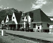 Corner view of Canadian National Railway Station, showing both the back and side façades, 1991.; Great Plains Research Consultants, B. Potyondi, 1991.