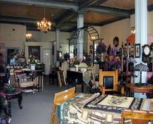 Interior view of the large second floor antiques shop – c. 2000; baldachin.com, 2002