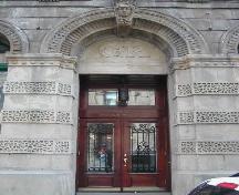This photograph shows the main entrance to the building, 2005.; City of Saint John