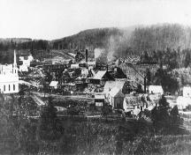 Image of the mines and the surrounding community during the period of albertite extraction.; Albert County Museum