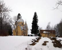 Contextual view, from the east, of St. John the Baptist Ukrainian Catholic Church, Menzie area, 2005; Historic Resources Branch, Manitoba Culture, Heritage and Tourism, 2005