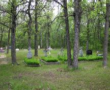 View of the cemetery where Mary MacKenzie is buried at the MacKenzie Presbyterian Church, near Evast Selkirk, 2005; Historic Resources Branch, Manitoba Culture, Heritage, Tourism and Sport, 2005