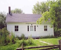 Bethune –Thompson Workers' Cottage, showing symmetrical north elevation, July 2004; OHT, 2006