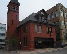 Of note is the northeast corner, displaying red brick and gabled dormer.; Kendra Green, 2007.