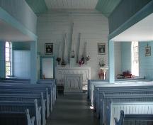 View of interior nave looking towards altar of Saint Margaret of Scotland Catholic Church, River Denys Mountain, Nova Scotia, 2002.; Inverness County Heritage Advisory Committe, 2002