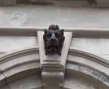 One of three lion heads located in the keystones of the arched windows on the main facade, 214 Duckworth Street. Photo taken June 13, 2007.; Deborah O'Rielly HFNL 2007