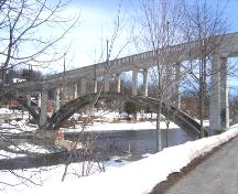 View of the bridge looking south from the walking trail beside Woolwich Street.; Mary Tivy, 2008.
