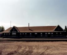General view of VIA Rail/Canadian National Railways Station at Portage la Prairie, showing the track-side façade, 1992.; Agence Parcs Canada / Parks Canada Agency, 1992.