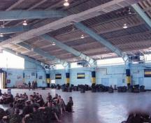 Interior view of the Drill Hall, showing the large central training space, 2003.; Department of National Defence / Ministère de la Défense nationale, 2003.