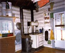 Interior view of the Isaac Creek Warden Cabin at Jasper National Park of Canada, 1996.; Parks Canada Agency / Agence Parcs Canada, 1996.