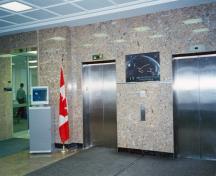 Interior view of the Administration Building, showing the marble walls and floor in the main lobby, 1998.; Parks Canada Agency/  Agence Parcs Canada, J. Mattie, 1998.