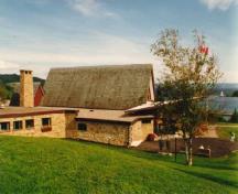 Exterior view of the side elevation of the Alexander Graham Bell Museum, showing the library and main gallery, 1996.; Parks Canada Agency / Agence Parcs Canada, 1996.