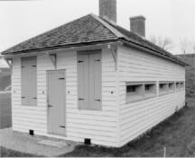 View of the Officers' Quarters, showing the small, loophole-style windows.; Agence Parcs Canada / Parks Canada Agency