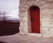 Detail of Point Clark lighthouse showing the round-headed doorway at its base, 1972.; Parks Canada Agency / Agence Parcs Canada, 1972