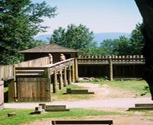 General view of the Northeast Bastion showing its walls on the second level that contain small windows and two doors which give access to the galleries on the north and west walls, 2002.; Parks Canada Agency / Agence Parcs Canada, M. Trepanier, 2002.