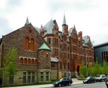 General view of Royal Conservatory of Music, showing the projecting bays, arched windows, pronounced stringcourses and lively roofline, 2011.; Royal Conservatory of Music, Canuckistan, May 2011.