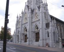 General view of St. Mary's Basilica, showing its imposing, stone construction, which reflects its importance as a cornerstone of the Roman Catholic community in Nova-Scotia, 2006.; Parks Canada Agency / Agence Parcs Canada, 2006.
