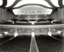 Interior view of Vogue Theatre, showing the streamlined Moderne design of the interior, evident in the sinuous, sweeping curves of the auditorium.; Vancouver Public Library, Historical Photo Collection, 16418.