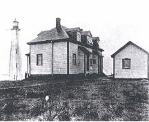 Historic photograph showing the light tower, light station dwelling, and shed, 1922; Library and Archives Canada | Bibliothèque et archives Canada, PA-165244