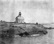 Historic photograph showing the Light tower; Jones Island Rear Range, ca. 1900.; Library and Archives Canada | Bibliothèque et Archives Canada, PA-148102