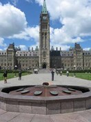General view of the Centennial Flame, in front of Centre Block, 2010.; Parks Canada Agency / Agence Parcs Canada, Catherine Beaulieu, 2010.