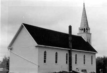 General view of the Saint-Antoine de Padoue Church, showing the west and north elevations; Parks Canada | Parcs Canada, 1982