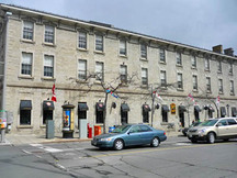 Side view of the Former Geological Survey of Canada Building showing the even, regularly placed door and window openings with distinct classical decorative trim identifying each storey, 2011.; Parks Canada | Parcs Canada, M. Therrien, 2011.