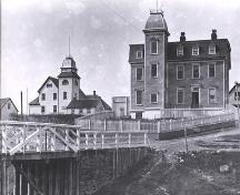 Historic photo view facing the Loyal Orange Lodge (at left) and Court House in Bonavista, some time post-1911; HFNL 2006