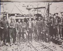 Dominion Company miners at the collar of the No. 2 Mine (above ground opening to the mine).  Date unknown, possibly 1920s.; No. 2 Mine and Museum, 2006