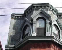 This photograph shows the mansard roof with the turreted dormer, 2004; City of Saint John