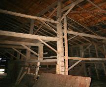 View of the interior timber framework of the Graham Barn, Minto area, 2004; Historic Resources Branch, Manitoba Culture, Heritage and Tourism, 2005