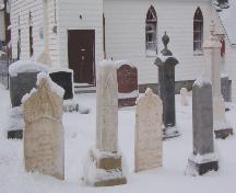 Photo of gravemarkers at Heyfield Memorial United Church Cemetery, Heart's Content, 2007/01/10.; L Maynard, HFNL 2007