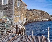 Photo view of Noah Chippett Stage/Twine Loft (water side and gable end) and Wharf, Leading Tickles, 2006.; HFNL 2007