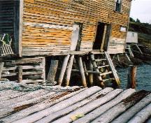 Photo view of the water side of Noah Chippett Stage/Twine Loft and adjoining wharf, Leading Tickles, 2005.; HFNL 2007