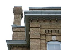 View of the cornice and brickwork detail on the Brandon Court House, Brandon, 2005; Historic Resources Branch, Manitoba Culture, Heritage, Tourism and Sport, 2005