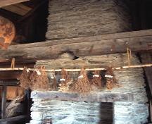 An image of the stone fireplace inside the Alexis Cyr House.; Madawaska Historical Society