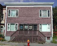This photograph shows the contextual view of the building on Harding Street, 2005.; City of Saint John