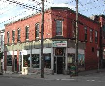 This photograph provides a contextual view of the building on Charlotte Street, 2005.; City of Saint John