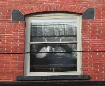 This image provides a view of a segmented arched window, 2005.

; City of Saint John