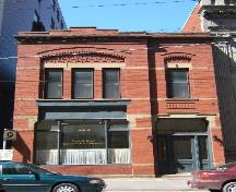 This photograph shows the contextual view of the building on Prince William Street, 2005.; City of Saint John