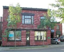 This image shows the contextual view of the building on Duke Street, 2005.; City of Saint John