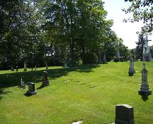 A photo of some of the tombstones of the Assomption Cemetery; The Valley District Planning Commision