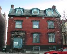 This photograph shows the contextual view of the building, 2005.; City of Saint John
