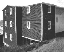 View of rear and side facade of John Quinton Limited Fish Store, Red Cliffe, NL. ; Heritage Foundation of Newfoundland and Labrador, 2005