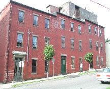 This photograph shows the contextual view of the 3 unit complex, 2005; City of Saint John
