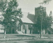 Showing church with tower, c. 1940s; MacNaught Archives Acc. 018.98